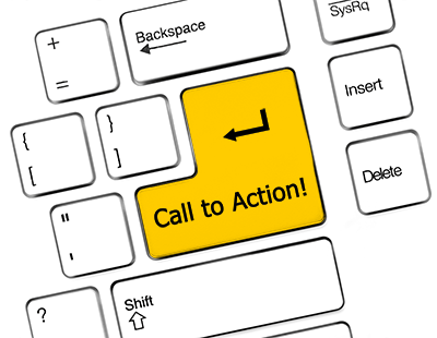 tastiera di un computer di colore bianco. Il tasto invio è di colore giallo intenso con una scritta di colore nero "Call To Action"