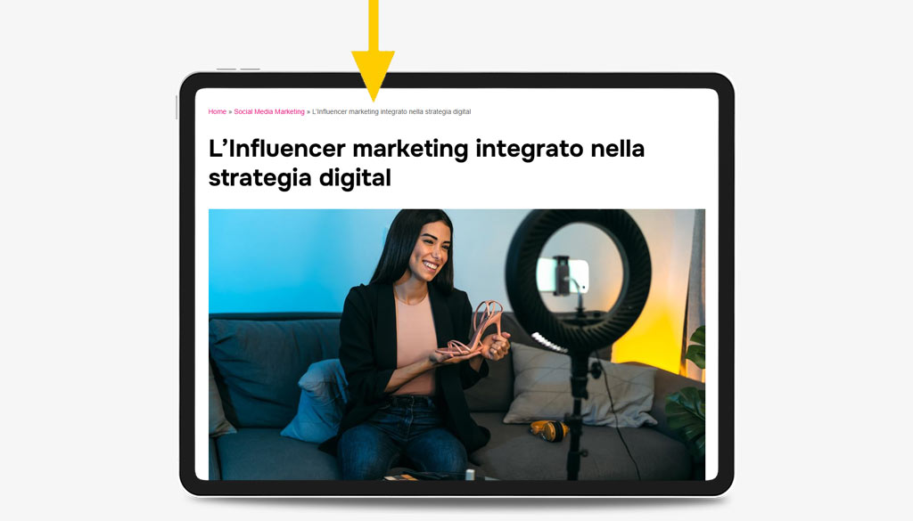 image of a tablet where an arrow highlights the breadcrumb of a Factory Communication blog article