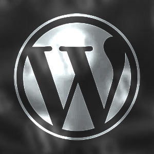 white WordPress logo on a dark background