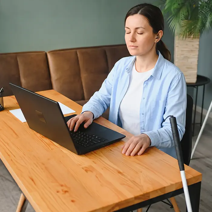 A blind person browses an accessible website