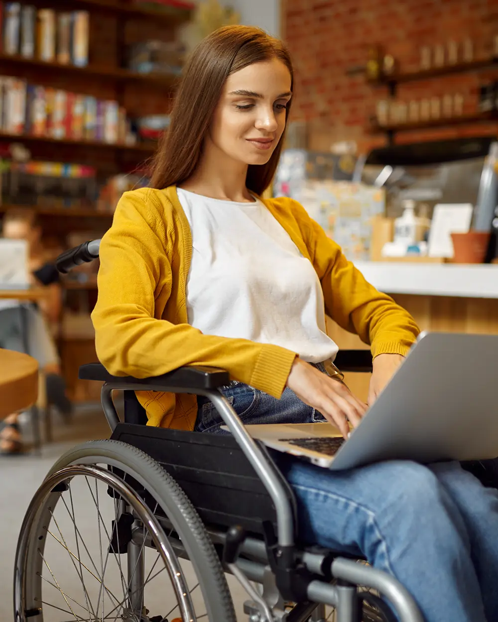 A person with a disability uses a computer to view an accessible website
