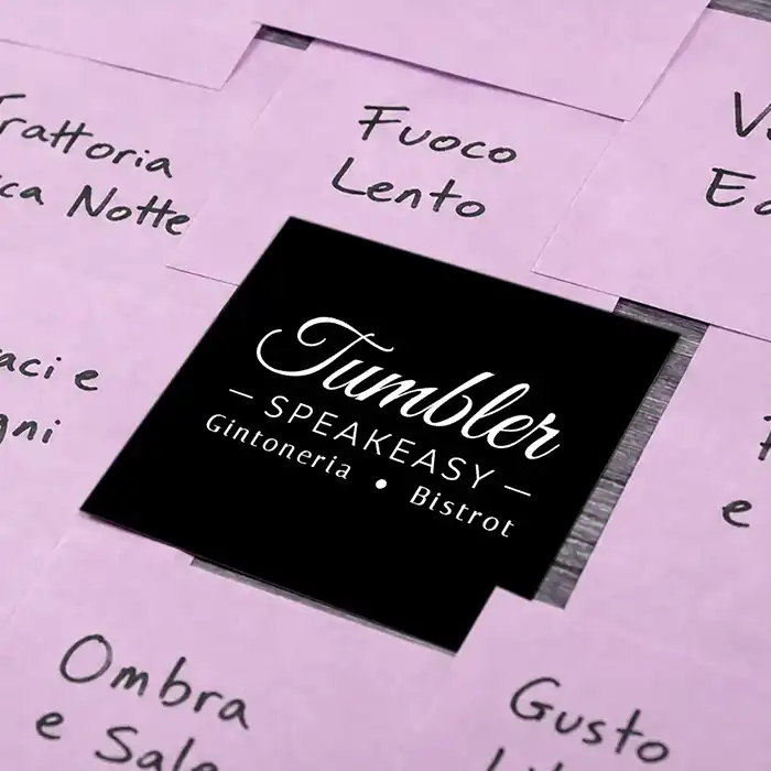Workshop table with notes and name suggestions during a brand-naming session